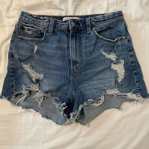 Distressed denim shorts
